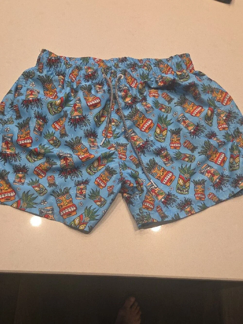 Kids' Light Blue Tiki Print Swim Trunks